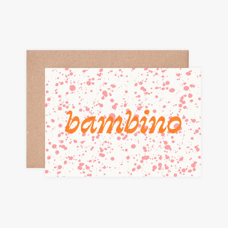 Greeting card with 'bambino' text and pink confetti on a white background