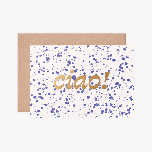 Greeting card with 'ciao!' text and blue dots on a white background, accompanied by a brown envelope.